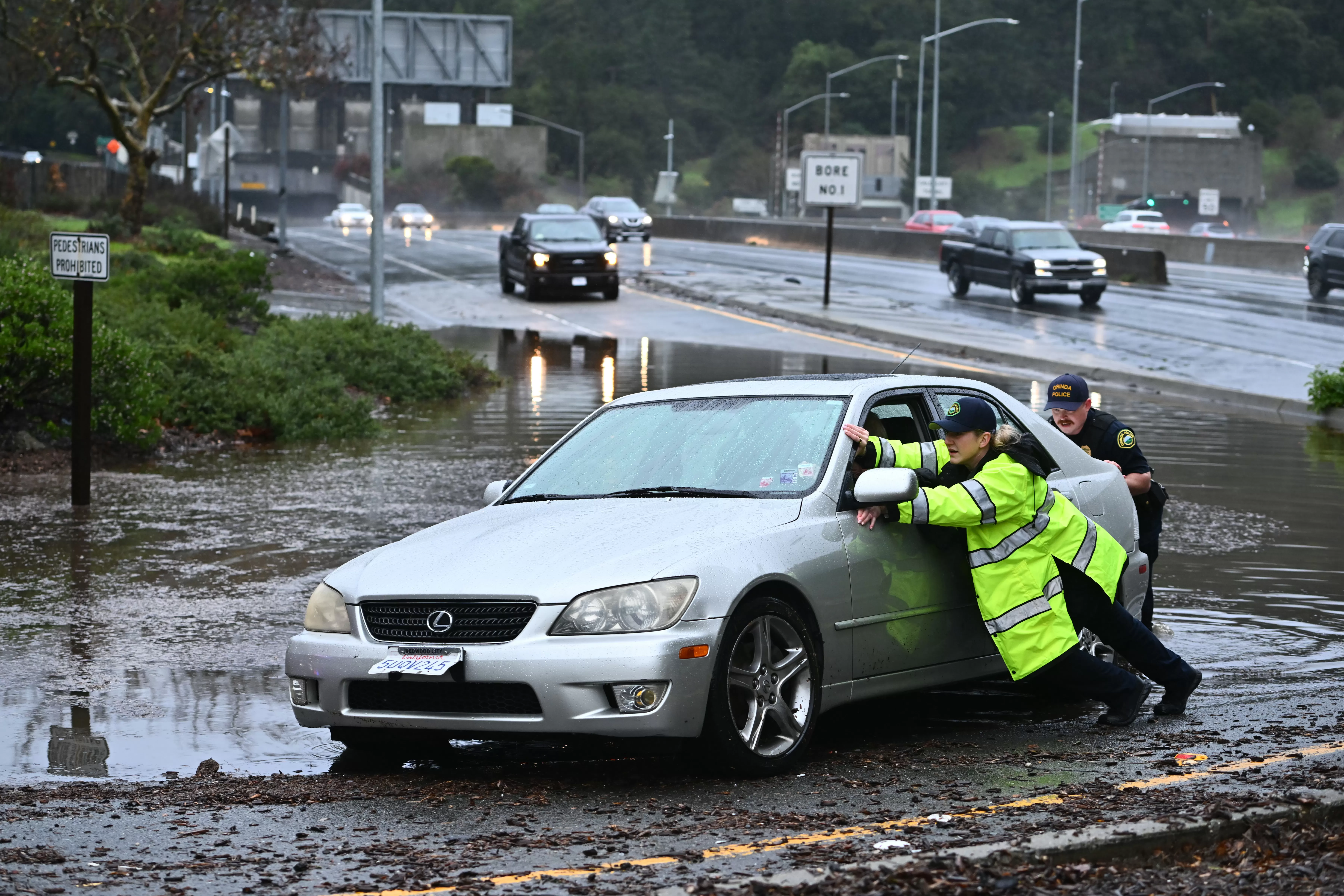 Rain continues in parts of California reeling from flooding and high tides