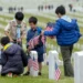 Photos: Scouts and volunteers place over 100,000 flags for Memorial Day