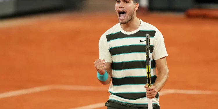 Alcaraz survives 3 match points to beat Sinner in longest French Open final ever
