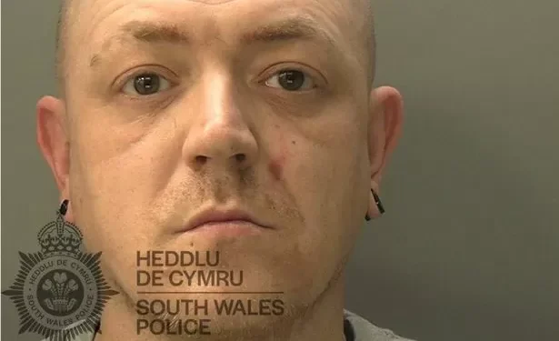 Armed man caught on camera in horrifying racist tirade