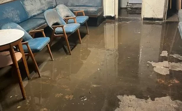 Landslide wrecks village social club