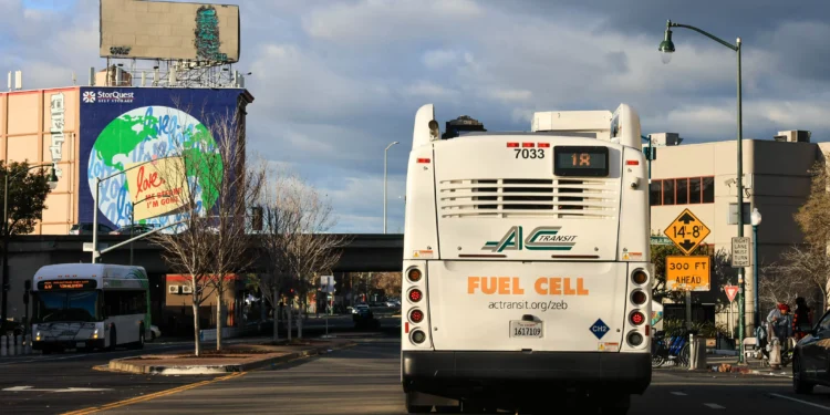 11 injured after AC Transit bus crashes into Oakland auto repair shop