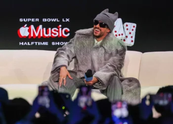 Celebrity Super Bowl sightings begin with Bad Bunny, Travis Kelce’s funky sweater